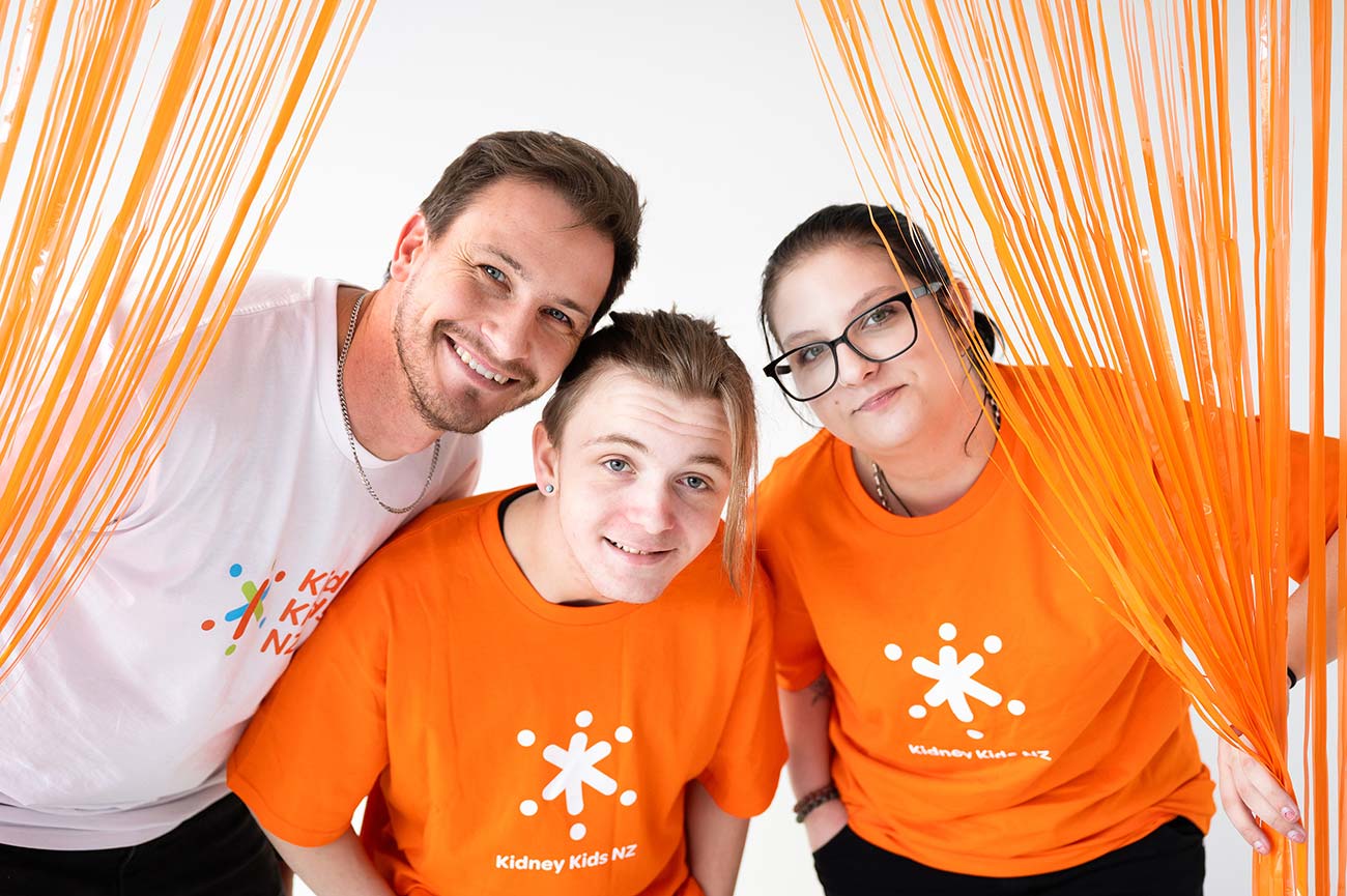 Kidney-Kids-NZ-walter-neilands-teenage-boy-girl-orange-curtain